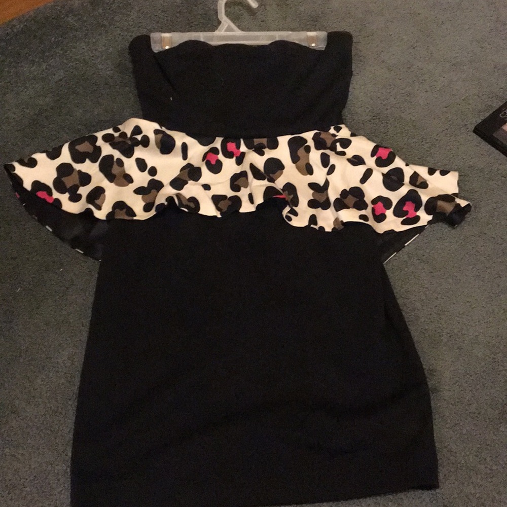 Black dress with cheetah fringe.